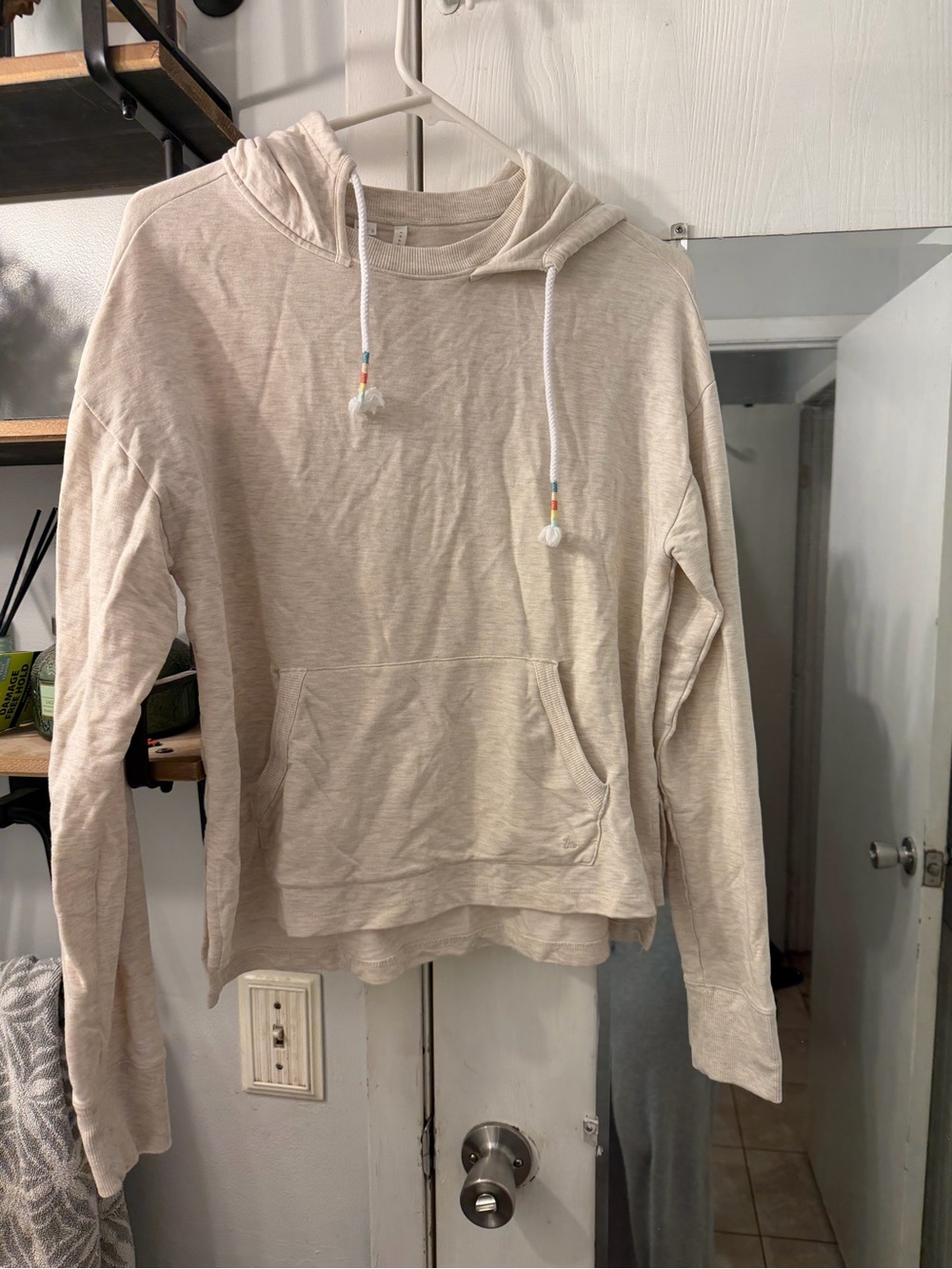Travis Matthew’s Women’s Cream Lightweight Hoodie Sweatshirt